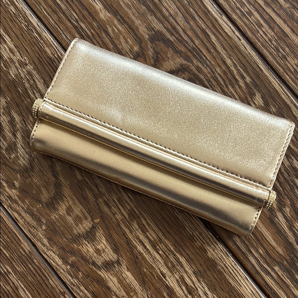 Ann Taylor NWT gold clutch